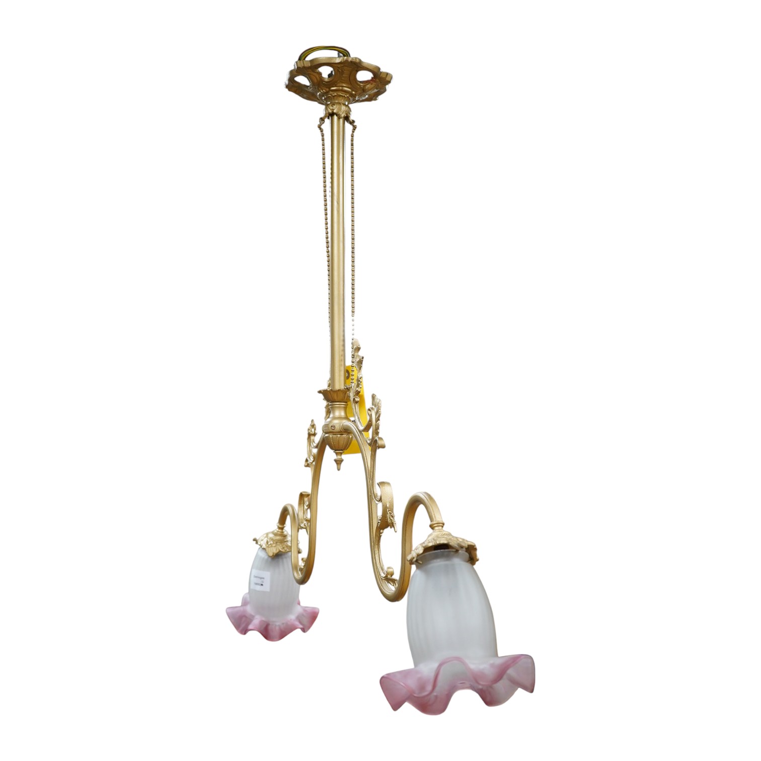 A French double arm ceiling light with frosted, pink edge glass shades, metal work stamped “F.CH &Co”, late 19th century, wired, overall 81cm high, 90cm wide. Condition - good